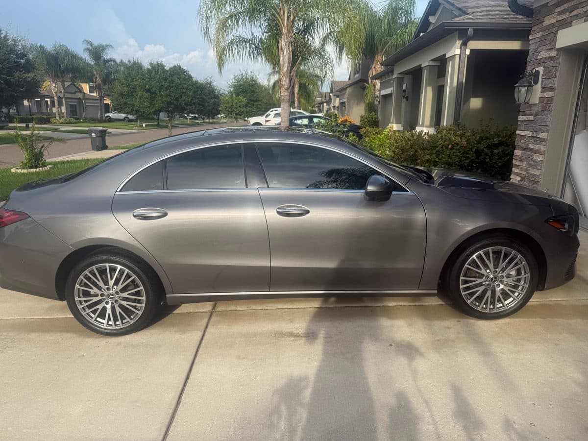 Detailed grey Mercedes-Benz CLA, glossy side profile